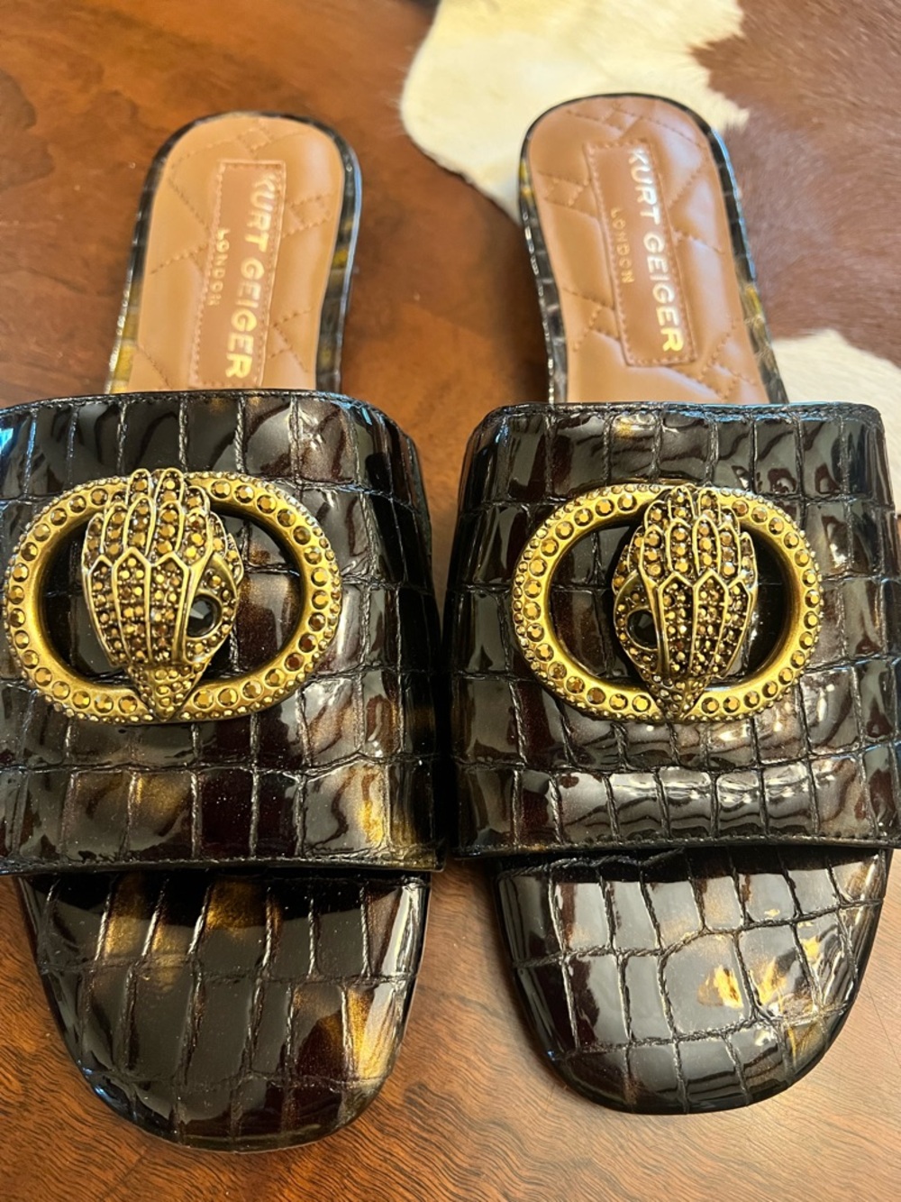 Kurt Geiger Dark Brown Croc-Embossed Slide Mules with Gold Emblem